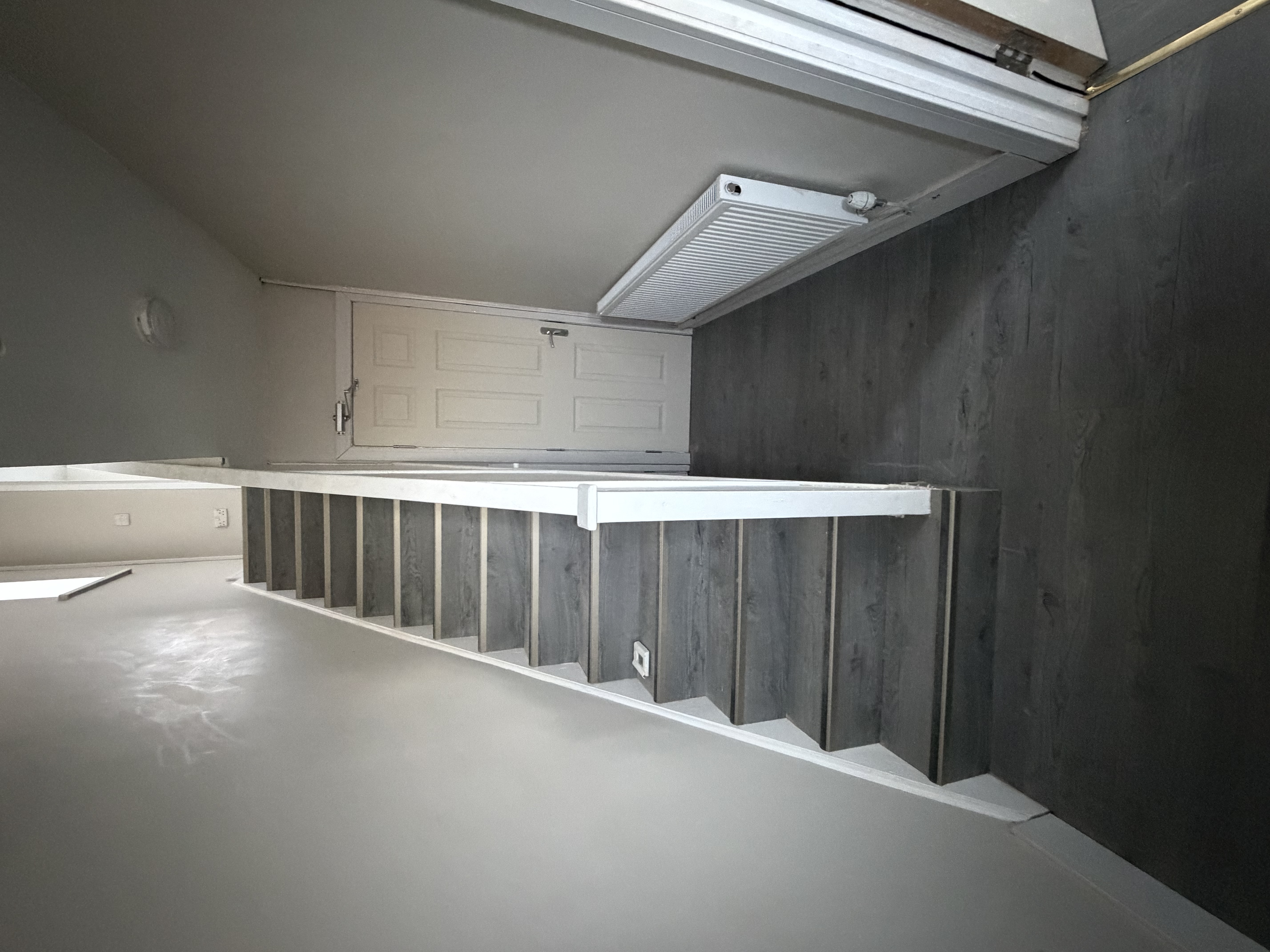 3 to 4 bedroom HMO conversion showing an insulated wall and ceiling fit-out